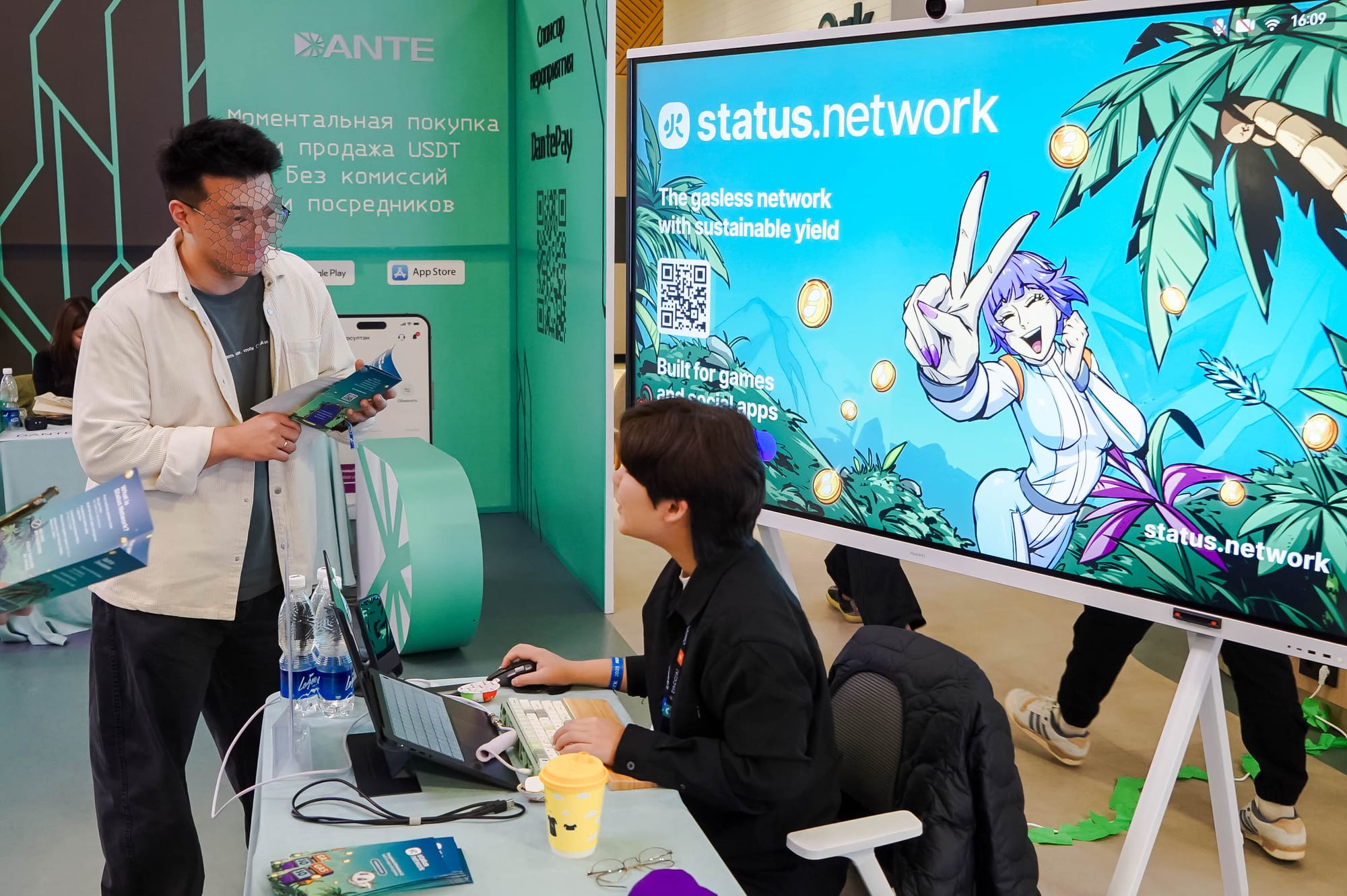 tatus Network gasless infrastructure booth at ETHBishkek hackathon.